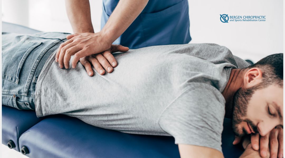 Chiropractic care for back pain on male patient