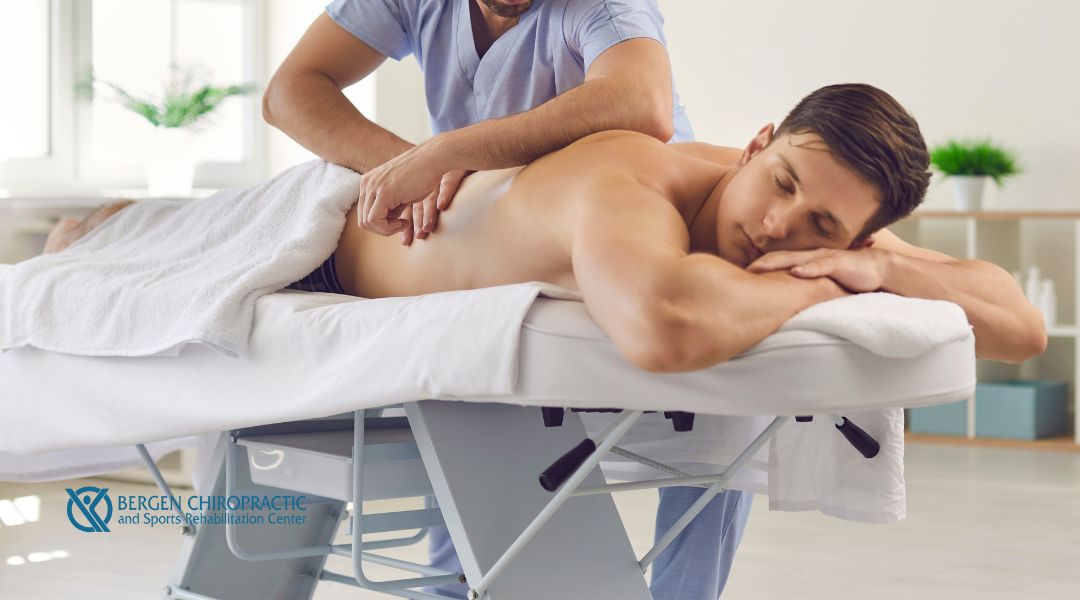 Massage on male patient's back