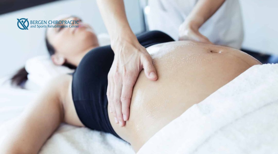Woman receiving belly massage